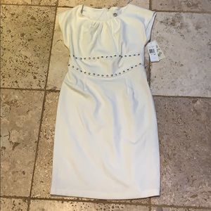 Cream colored dress with studs